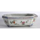 A 19TH CENTURY CHINESE HEXAGONAL PORCELAIN CENSER painted with floral sprays. 6.5ins wide.