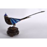 AN EARLY 20TH CENTURY CHINESE SILVER GILT AND ENAMEL BIRD OF PARADISE modelled with coral eyes and