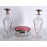 A PAIR OF EARLY 20TH CENTURY CONTINENTAL CUT GLASS AND ENAMEL SCENT BOTTLES AND STOPPERS together