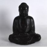 A 19TH CENTURY JAPANESE MEIJI PERIOD BRONZE FIGURE OF A BUDDHA modelled with hands clasped.