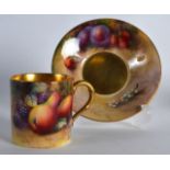 A ROYAL WORCESTER FRUIT PAINTED COFFEE CAN AND SAUCER the can by Moseley & saucer by Ayrton C1927.