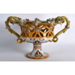 A 19TH CENTURY CANTAGALLI STYLE OPENWORK FAIENCE BOWL painted with a putti holding aloft an arrow.