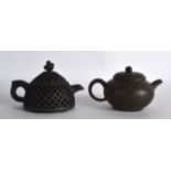 TWO CHINESE YIXING POTTERY BROWN TEAPOTS AND COVERS one reticulated, the other gold splash. 5Ins