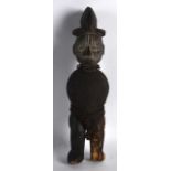 AN UNUSUAL EARLY 20TH CENTURY AFRICAN PARTIAL POLYCHROMED FETISH FIGURE. 1Ft 5ins high.