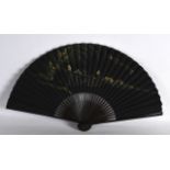 A CHINESE BAMBOO FAN painted with a scholar within a landscape, the reverse decorated with