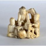 A GOOD 19TH CENTURY JAPANESE MEIJI PERIOD CARVED IVORY OKIMONO modelled as numerous figures beside a