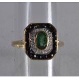 A 9CT EMERALD SAPPHIRE AND DIAMOND RING.