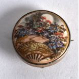 AN EARLY 20TH CENTURY JAPANESE MEIJI PERIOD SATSUMA BROOCH painted with foliage. 1.5ins diameter.