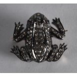 A GOLD DIAMOND AND SILVER FROG BROOCH.