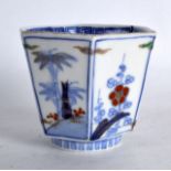 A 19TH CENTURY JAPANESE MEIJI PERIOD HEXAGONAL PORCELAIN BEAKER painted with flowers. Signed. 2.