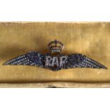 A GOLD SILVER DIAMOND AND SAPPHIRE RAF BROOCH.