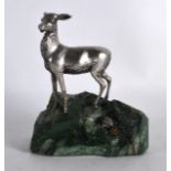 AN EARLY 20TH CENTURY CONTINENTAL SILVER DEER modelled upon a malachite base. 4.75ins wide.