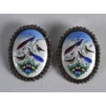 A PAIR OF EARLY 20TH CENTURY PERSIAN PAINTED ENAMEL AND WHITE METAL BROOCHES.