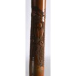 AN EARLY 20TH CENTURY JAPANESE MEIJI PERIOD CARVED BAMBOO WALKING CANE. 3Ft long.