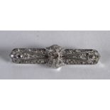 A PLATINUM AND DIAMOND LADIES BAR BROOCH.