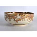 AN EARLY 20TH CENTURY JAPANESE MEIJI PERIOD SCALLOPED SATSUMA BOWL painted with lakeland landscapes.