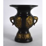 A LATE 19TH CENTURY JAPANESE MEIJI PERIOD BRONZE TWIN HANDLED VASE with gilt panels. 5Ins high.