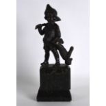 A LATE 19TH CENTURY EUROPEAN BRONZE FIGURE OF A CHILD HUNTER modelled holding a rifle in one hand,