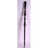 AN EARLY 20TH CENTURY AFRICAN CARVED WOOD EBONISED STAFF carved with sun burst motifs. 2Ft 6ins