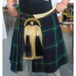 AN EARLY 20TH CENTURY SCOTTISH KILT AND SPORRON, by Heather McMaster.