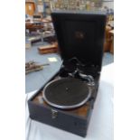 A VINTAGE HMV PHONOGRAPH, in a leather bound case.