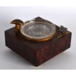 A RARE EARLY 20TH CENTURY EUROPEAN WALNUT AND CLEAR GLASS MUSIC BOX decorated with putti amongst