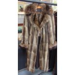 A TWO TONED LADIES FUR JACKET