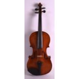 AN ANTIQUE VIOLIN with two piece back, bearing label to interior 'Stradivarius'. 1Ft 11ins long.