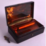 A GOOD 19TH CENTURY SWISS CARVED TORTOISESHELL MUSIC BOX by F Lecoultre, with repair certificate