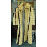 A BIEGE AND BROWN LADIES FUR JACKET