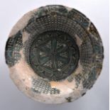 A Large Sultanabad Bowl, 13th/14th Century, painted with motifs and geometric symbols. 1Ft 1.5ins