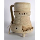 An Unusual Fitted 9th/10th Century Persian Jug on stand, incised with floral motifs. 7Ins high.