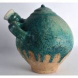 A Good 8th/9th Century Persian blue glazed gourd vessel, with twin loop handles and circular finial.