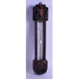 A 19TH CENTURY NEGRETTI & ZAMBRA ENAMELLED THERMOMETER within a Chinese carved hardwood case