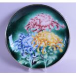 AN EARLY 20TH CENTURY JAPANESE CLOISONNE ENAMEL DISH decorated with three floral sprigs. 29 cm