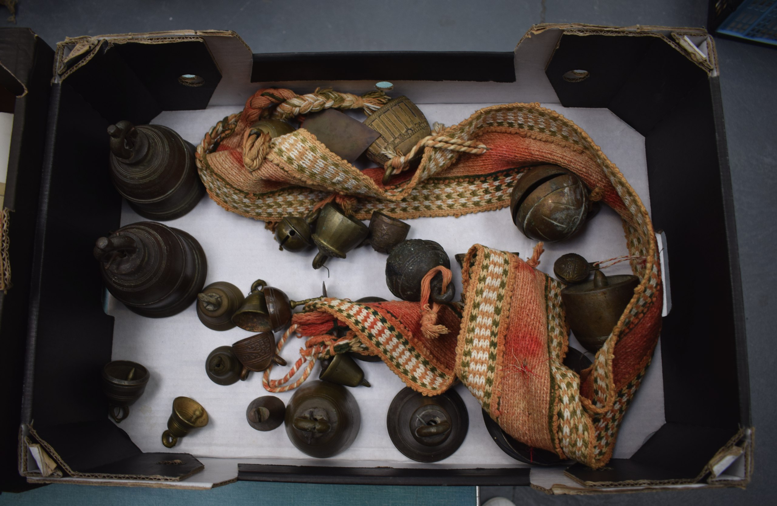 A GROUP OF ANTIQUE BRONZE & BRASS BELLS in various forms and sizes. (qty)