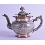 A LATE 19TH CENTURY CHINESE EXPORT SILVER TEAPOT AND COVER decorated with birds perched amongst