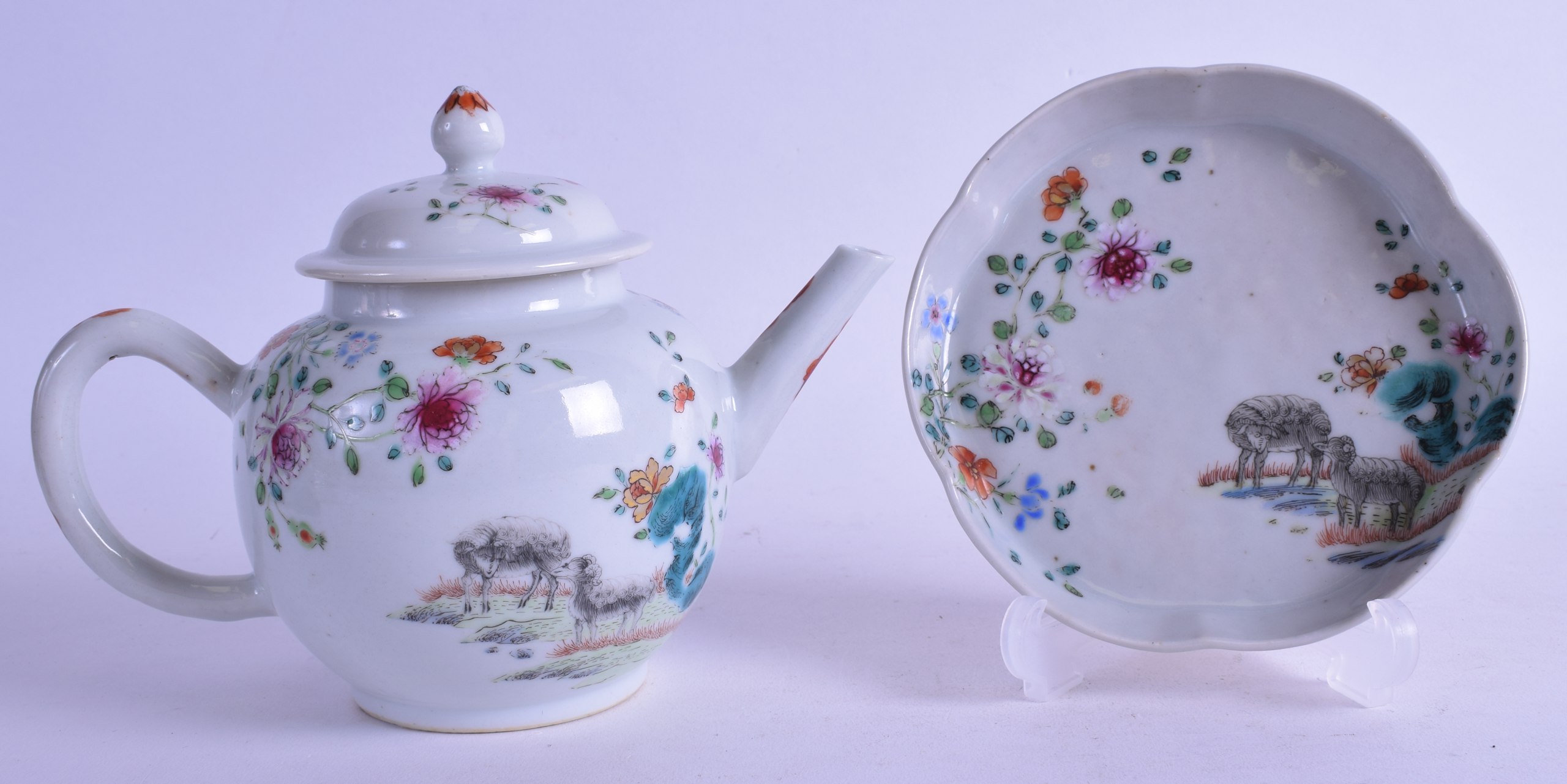 AN 18TH CENTURY CHINESE EXPORT PORCELAIN TEAPOT AND COVER ON STAND Qianlong, painted with two