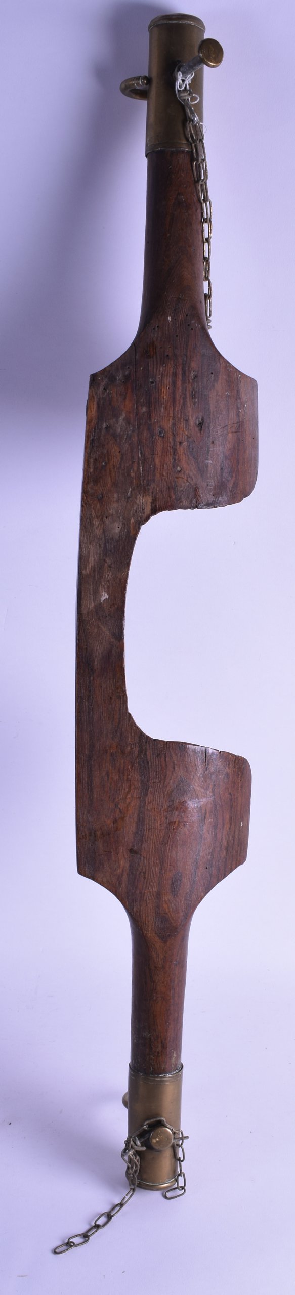 A CONTINENTAL BRASS AND HARDWOOD YOKE.