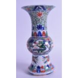 A CHINESE WUCAI PORCELAIN GU SHAPED VASE bearing Wanli marks to base, painted with dragons and