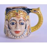 AN UNUSUAL EARLY 20TH CENTURY CONTINENTAL POLYCHROME AND GILT CHARACTER TANKARD with stylised bird