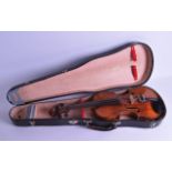 A CASED VIOLIN with two piece back. 59 cm long.