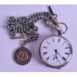 A VICTORIAN GENTLEMANS SILVER POCKET WATCH with attached silver chain & medallion. 4.75 cm