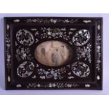 A 19TH CENTURY CHINESE CARVED HONGMU AND MOTHER OF PEARL FRAME decorated with scrolling foliage