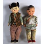 A PAIR OF CHINESE REPUBLICAN PERIOD SILK AND PORCELAIN DOLLS. 1Ft 2.5ins long.