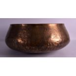 A GOOD PERSIAN/SYRIAN BRASS BOWL 10th/12th Century, incised with calligraphy, flowers and circular