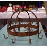 A FRENCH WROUGHT IRON GAME HANGING RACK.