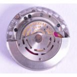 A VINTAGE MONTRES ROLEX S A WATCH MOVEMENT. No. DB1582. 2.75 cm diameter.