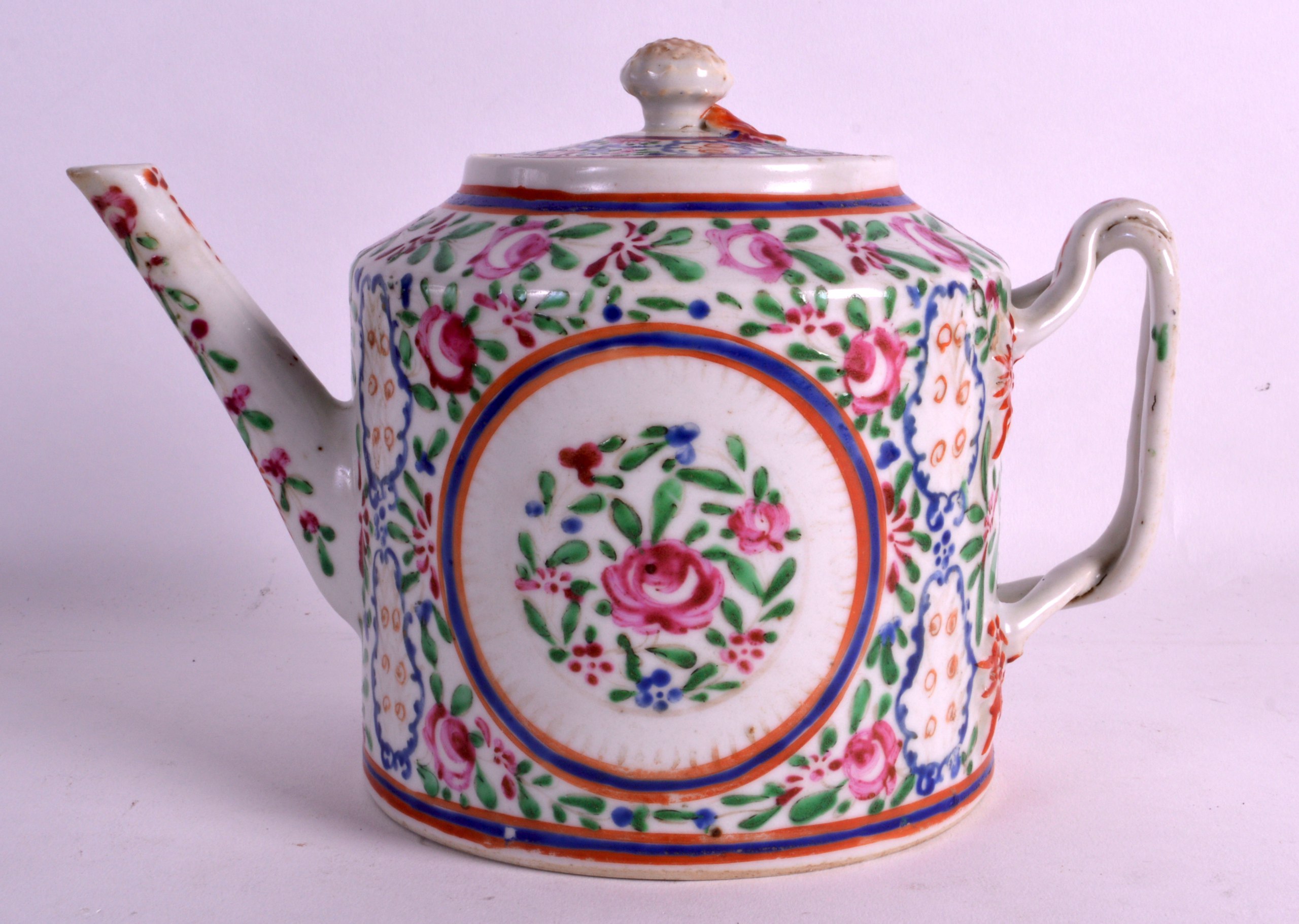 AN 18TH CENTURY CHINESE EXPORT PORCELAIN TEAPOT AND COVER Qianlong, painted with flowers. 8.75ins