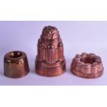A GOOD VICTORIAN COPPER JELLY MOULD together with two other antique jelly moulds. Largest 22 cm